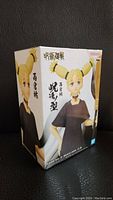 Box front showcasing Momo Nishimiya figure from Jujutsu Kaisen with character name and series title in Japanese.