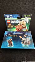 Front view of sealed Lego Dimensions Lord of the Rings Gimli Fun Pack 71220 box with visible minifigure and chariot images