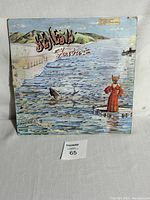 Front cover of Genesis Foxtrot album with anthropomorphic fox figure and water scene
