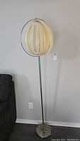 Full view of floor lamp showing height, shade, pole, and base.