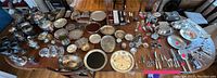 Wide overview of the entire collection laid out on a wooden table