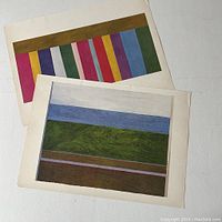 Two Canadian art prints laid flat showing abstract colorful geometric art (vertical stripes vs horizontal landscape bands)