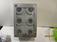 Boxed set of six 3 inch recessed pot lights by Commercial Electric, clear front packaging showing all six lights inside.