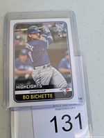 Front of the 2020 Bo Bichette rookie baseball card showing the player in batting stance, with card details including Highlights, Shortstop position, and rookie card logo.