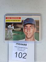 Front view of Jose Valdivielso 1956 Topps baseball card showing player portrait and action shot.