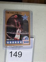 Front of 1990 NBA Hoops Michael Jordan All-Star basketball card showing player in action and event logos.