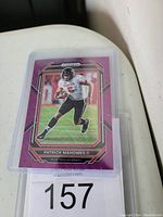 Front of Patrick Mahomes Purple Prizm football card showing player in action with purple border and Prizm pattern.