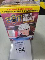Front view of the sealed 2020-21 Upper Deck Hockey Blaster Box with branding and player image.