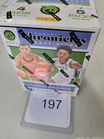 Sealed blaster box showing front artwork with two basketball players and branding details.