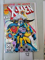 Front cover of The Uncanny X-Men #300 with chrome effect and vibrant colors showing X-Men characters.