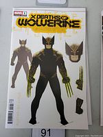 Front cover of the X-Deaths of Wolverine #1 Spoiler Variant Marvel Comic Book featuring Wolverine in a digital/circuitry style design.