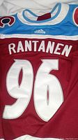 Back of maroon Adidas hockey jersey with white stitched name 'RANTANEN' and number '96' in large size, with blue and white accent stripes on shoulders.