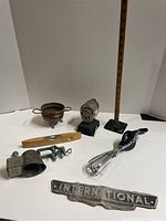Overview of all small miscellaneous items including measuring tools, kitchen tools, and collectibles