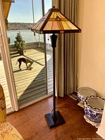 Full height view of lamp near sliding glass door