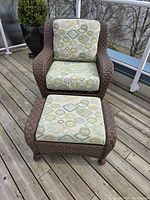 Front view of chair and ottoman showing cushions and frame