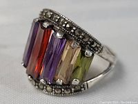 Close-up of ring showing side view with rectangular stones and marcasite detail