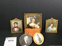 Group arrangement of all five miniature portraits on display