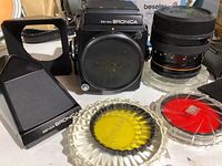 Zenza Bronica SQ-A camera body with Zenzanon PF 80mm lens, prism viewfinder, lens hood and color filters