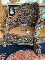 Front and profile view showing overall carving and seat area