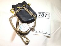 Pocket watch, chain, and leather pouch with lot tag