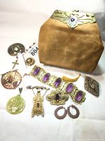 Overview of all lot items including purse, jewelry and accessories