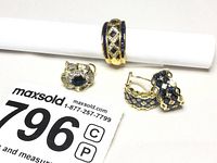 All three pieces grouped on white surface with lot card visible