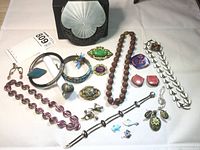 Flat lay of clutch and all jewelry pieces