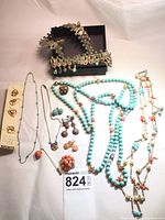 All jewelry items arranged on white background