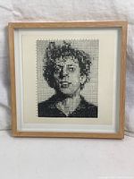 Front view of framed print showing full image and frame