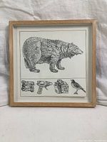 Frontal view of framed Don Nice print showing bear and predella