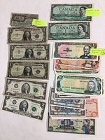 U.S. and Canadian banknotes including $1 silver certificates, Federal Reserve notes, $10 National Bank Note and two 1954 Canada $1 notes