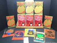 Full set display of 19 vintage psychedelic music postcards with colorful 1960s concert art at the Fillmore Auditorium and Avalon Ballroom in San Francisco. Multiple cards shown including Bo Diddley and Chuck Berry/Eric Burdon posters.