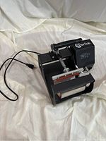 Color Sub mug press machine with power cord and handle lever, digital control panel visible