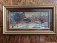 Frontal view of the vintage gilt framed watercolor painting depicting fall colors in a nature scene with signature ETH visible.