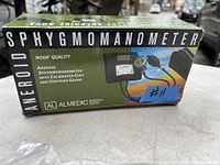 Box of aneroid sphygmomanometer showing branding, product name, and box condition with sticker #11