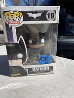 Front view of Pop! Heroes Batman vinyl figure in unopened box from The Dark Knight Trilogy collection.