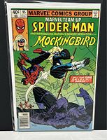 Front cover of Marvel Team-Up Spider-Man and Mockingbird #95 comic book in a clear protective bag and board.