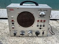 Front view of the EICO Model 147 A Signal Tracer showing speaker grille, audio input, RF input, various control knobs and output transformer connectors.