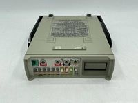 Front view of FLUKE 8010A digital multimeter showing the input ports, switches, and display screen.