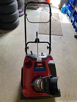 Full front view of Toro CCR 3650 snowblower showing handlebar, fuel cap, and chute.