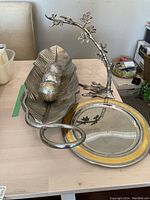 Full lot view showing the tray, leaf bowl with balls, and tree stand on a table.