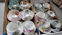 Overhead view of all teacup and saucer pairs arranged in box