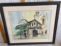Full view of framed illustrated print of a church, showing overall color and frame details