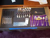 Overview of all flatware pieces displayed in drawer
