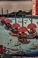Close view of the woodblock print showing red decorated festival boats on a blue river with distant landscape and Japanese text panel.