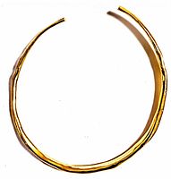 Front view of the vintage signed J. Crew solid brass choker, showing the slightly hammered texture and open-ended design.