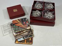 Five Yeduree Craft Shop World Heritage plastic and cork coasters in original box, also displaying original packaging and informational card.