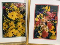 Two framed original wildflower photographs by Michael S. Wright showing colorful floral arrangements in gold and white frames.