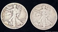 Obverse side of two Walking Liberty half dollars dated 1941-D and 1944 no mint mark showing Lady Liberty walking with sun rising behind her.