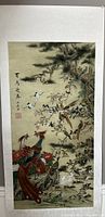 Full view of the Chinese watercolor painting showing a large phoenix on rock surrounded by many birds on branches with blossoms, calligraphy, and artist seals.